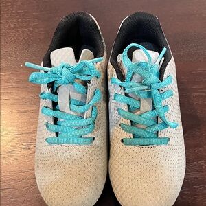 Kids DSG soccer cleats size 11k.